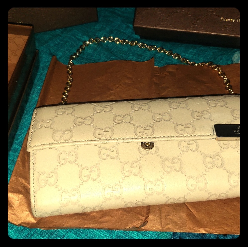 Beige Gucci clutch